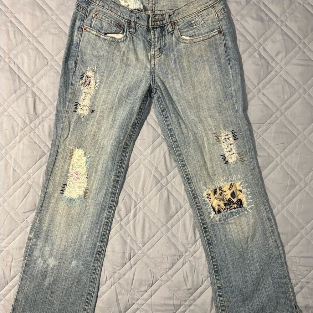 Women's Distressed Blue Jeans